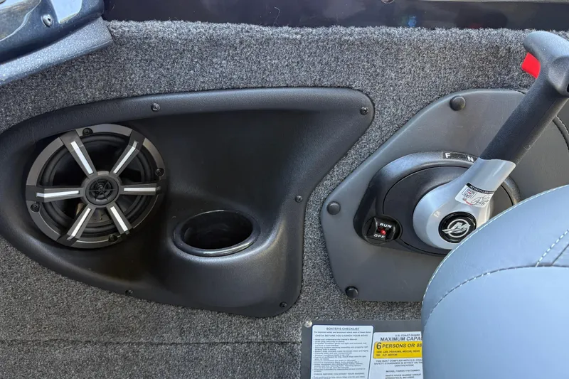 Slide: The Image of Interior of 2026 Tracker Targa V-18 Combo boat with speaker and control panel. - 55