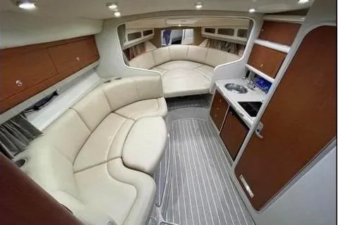 Slide: The Image of Interior of a 2004 Chaparral Signature 290 yacht with elegant furnishings. - 8