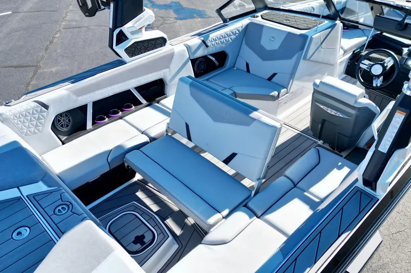 Slide: The Image of 2023 Nautique Super Air Nautique GS22 interior with luxurious seating and modern design. - 14