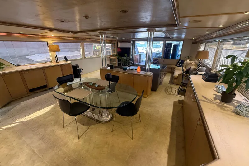 Slide: The Image of Luxurious interior of a 1990 Denison Pilothouse Cockpit Motoryacht with elegant furnishings. - 21