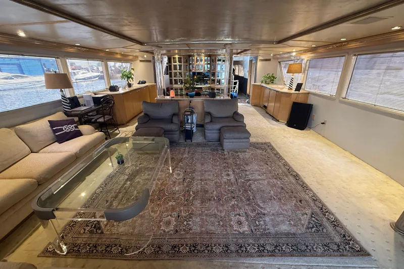 Slide: The Image of Luxurious interior of 1990 Denison Pilothouse Cockpit Motoryacht with elegant furnishings and decor. - 38