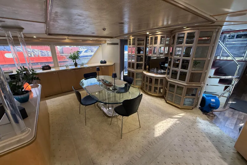 Slide: The Image of Luxurious interior of 1990 Denison Pilothouse Cockpit Motoryacht with elegant dining area. - 41