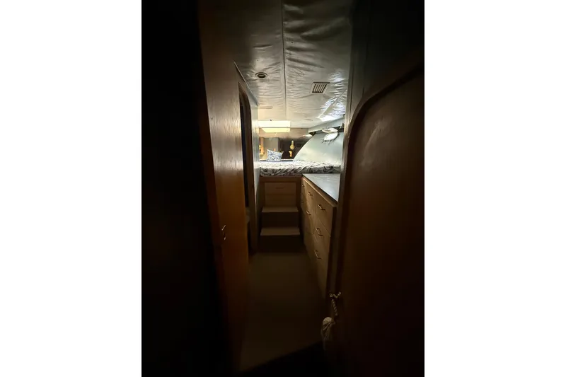 Slide: The Image of 1990 Denison Pilothouse Motoryacht interior with cozy cabin and wooden cabinetry. - 47