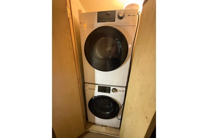 Slide: The Image of Stacked washer and dryer in Denison Pilothouse Cockpit Motoryacht, 1990 model. - 83