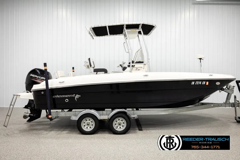 Slide: The Image of 2017 Bayliner Element F21 boat on trailer in indoor showroom. - 3
