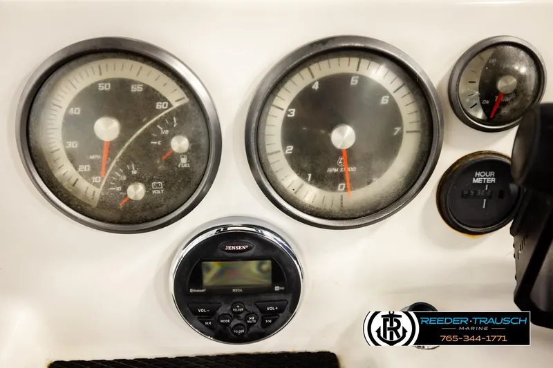 Slide: The Image of 2017 Bayliner Element F21 dashboard with gauges and Jensen audio system. - 31
