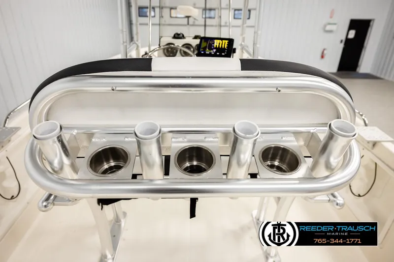 Slide: The Image of 2017 Bayliner Element F21 boat with rod holders and cup holders, Reeder-Trausch Marine logo. - 45