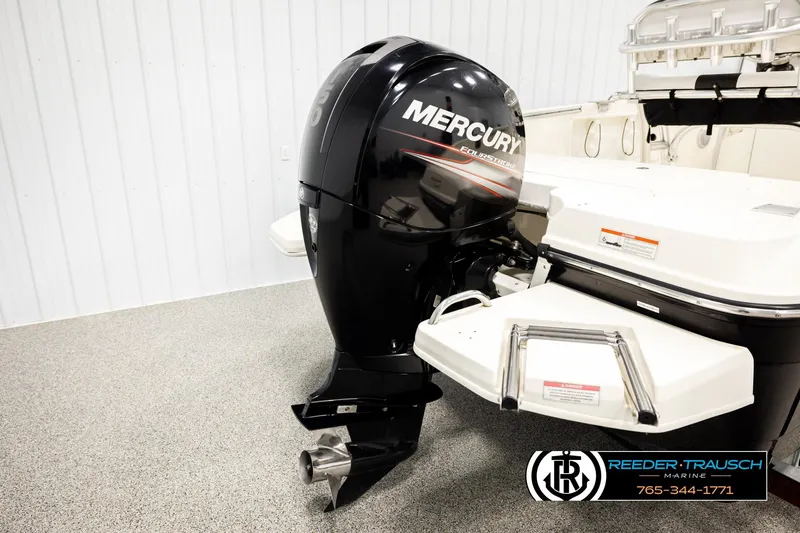 Slide: The Image of 2017 Bayliner Element F21 with Mercury outboard motor in showroom. - 50