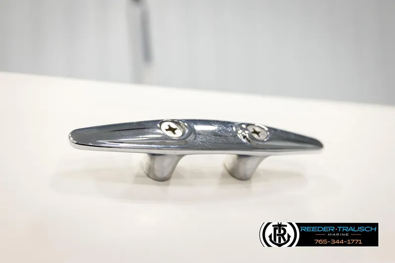 Slide: The Image of Chrome boat cleat on a 2017 Bayliner Element F21, Reeder-Trausch Marine logo visible. - 57