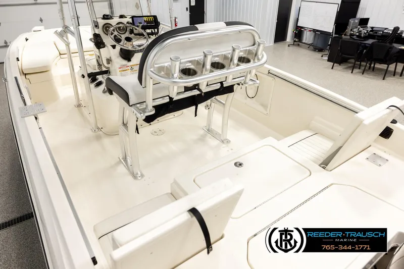 Slide: The Image of 2017 Bayliner Element F21 boat interior with steering console and seating. - 9