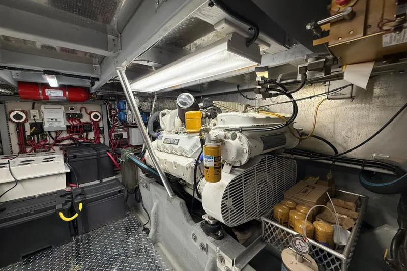 Slide: The Image of Engine room of 1998 Mainship 47 Motor Yacht with Caterpillar engine and equipment. - 66