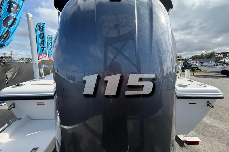 Slide: The Image of 2020 Key West 176 Sportsman CC boat with 115 horsepower engine at a sale event. - 11