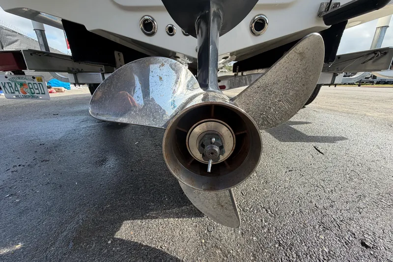 Slide: The Image of Propeller of 2020 Key West 176 Sportsman CC boat on trailer, close-up view. - 12