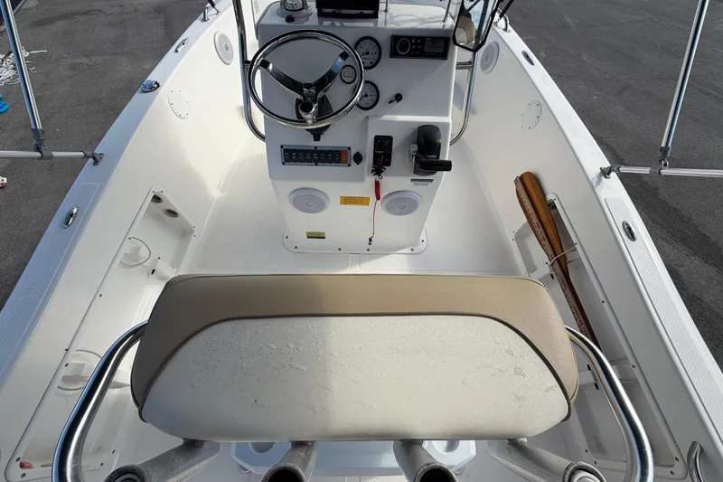 Slide: The Image of 2020 Key West 176 Sportsman CC boat interior with steering console and seating. - 18