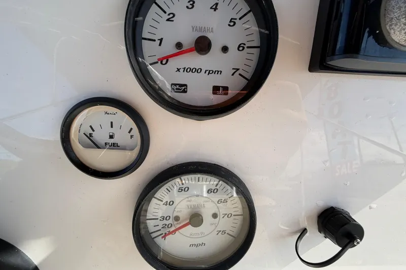 Slide: The Image of Dashboard gauges of a 2020 Key West 176 Sportsman CC boat. - 24