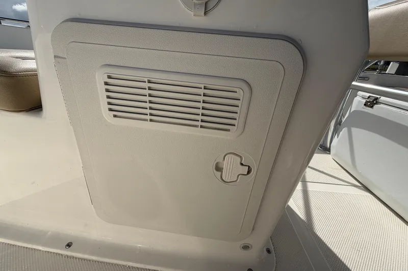 Slide: The Image of 2020 Key West 176 Sportsman CC boat console with vent and latch detail. - 27