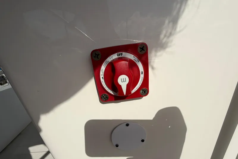 Slide: The Image of Red battery switch on 2020 Key West 176 Sportsman CC boat. - 29
