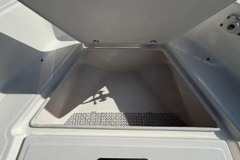 Slide: The Image of Open storage compartment on 2020 Key West 176 Sportsman CC boat. - 33
