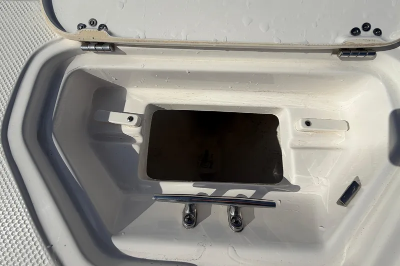 Slide: The Image of Open storage compartment on 2020 Key West 176 Sportsman CC boat. - 35