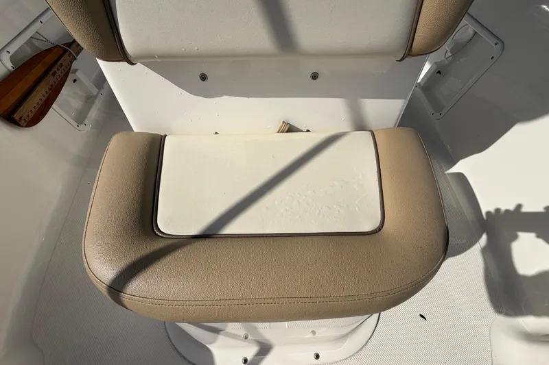 Slide: The Image of 2020 Key West 176 Sportsman CC boat seat with beige and white upholstery. - 41