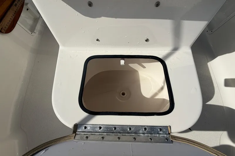 Slide: The Image of Open storage compartment on 2020 Key West 176 Sportsman CC boat. - 42
