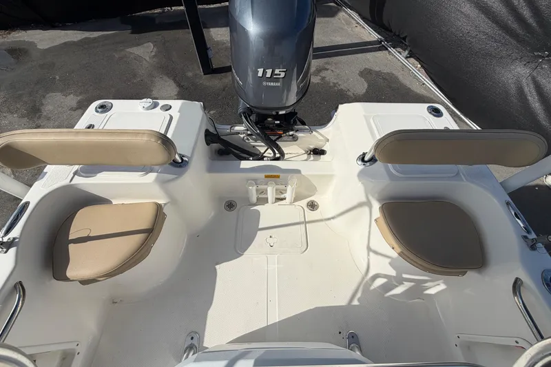 Slide: The Image of 2020 Key West 176 Sportsman CC boat interior with Yamaha 115 engine. - 46