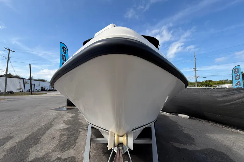Slide: The Image of 2020 Key West 176 Sportsman CC boat on trailer, clear sky background. - 5