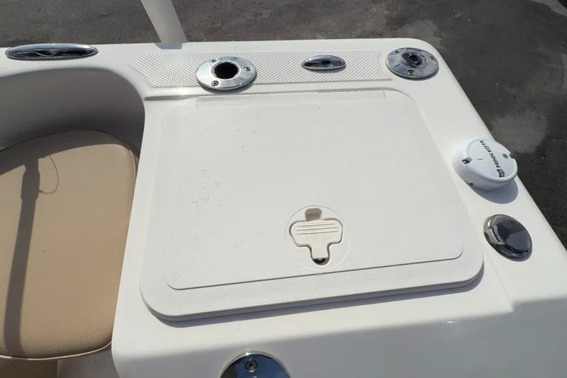 Slide: The Image of 2020 Key West 176 Sportsman CC boat deck with storage compartment and accessories. - 50