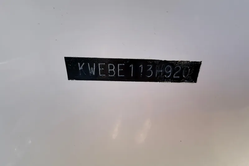Slide: The Image of 2020 Key West 176 Sportsman CC hull identification number on white surface. - 54