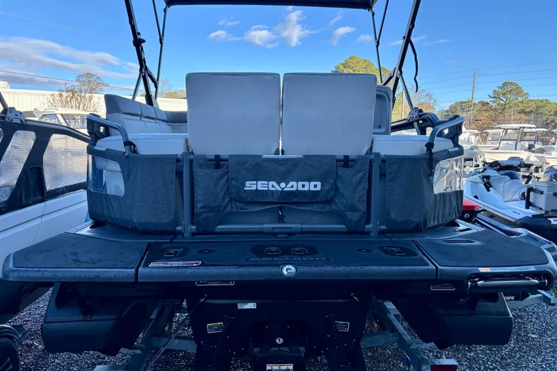 Slide: The Image of 2024 Sea-Doo Switch Sport 18 rear view, showcasing seating and deck features. - 5