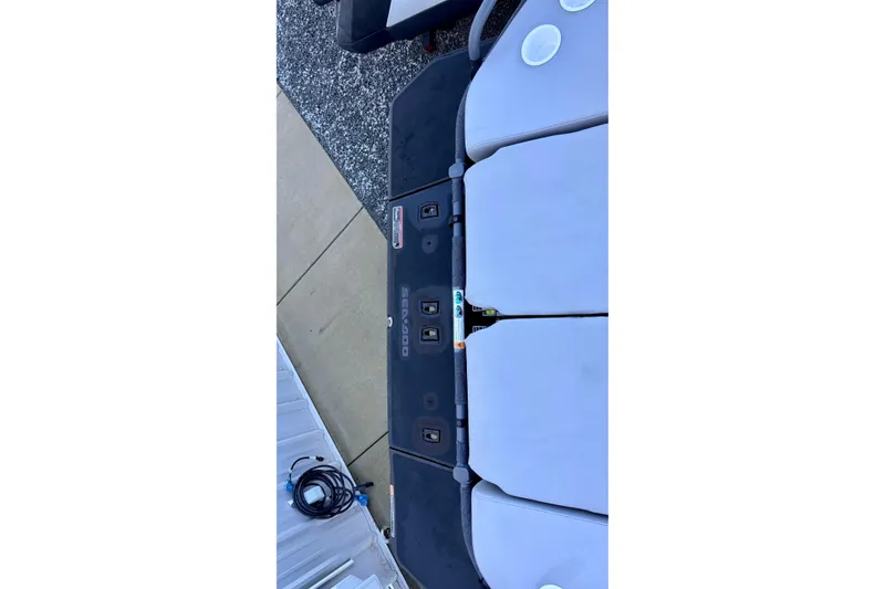 Slide: The Image of 2024 Sea-Doo Switch Sport 18 interior seating and deck view. - 6