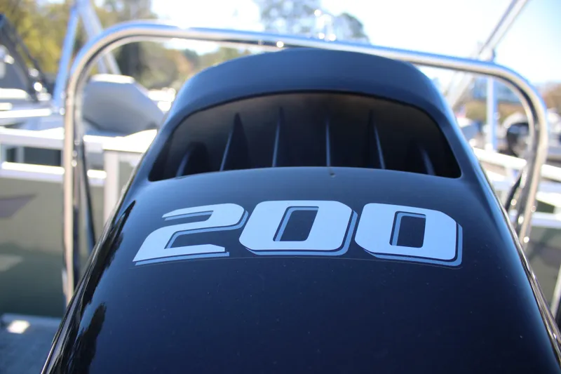 Slide: The Image of Close-up of a 200 horsepower engine on a 2026 Tahoe Pontoon Sport 85 Rear Fish. - 4