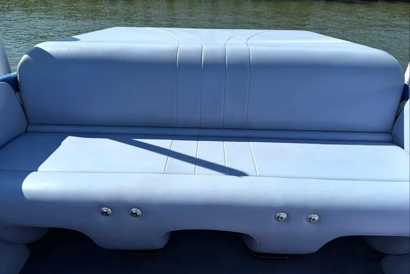 Slide: The Image of 2001 Nor-Tech 38 Super Vee boat seat with light blue upholstery. - 6