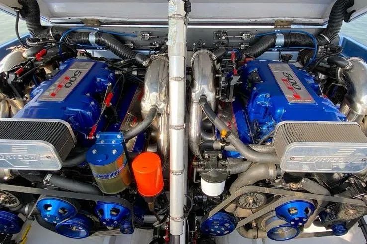 Slide: The Image of Twin high-performance engines in a 2001 Nor-Tech 38 Super Vee boat. - 9