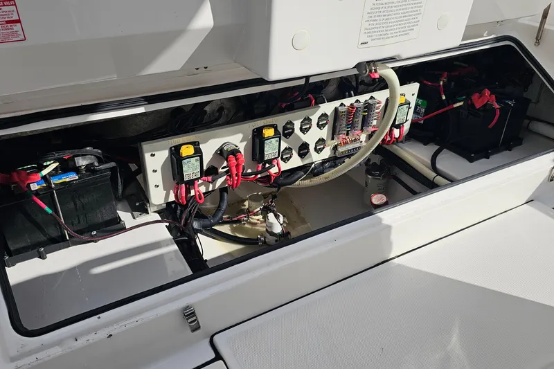 Slide: The Image of Electrical system of 2021 Everglades 273 Center Console boat, showing batteries and wiring. - 49