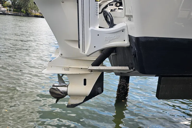 Slide: The Image of 2021 Everglades 273 Center Console boat engine detail on water. - 53