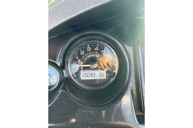 Slide: The Image of Close-up of 2022 Monterey 255SS Super Sport tachometer displaying 228 engine hours. - 15