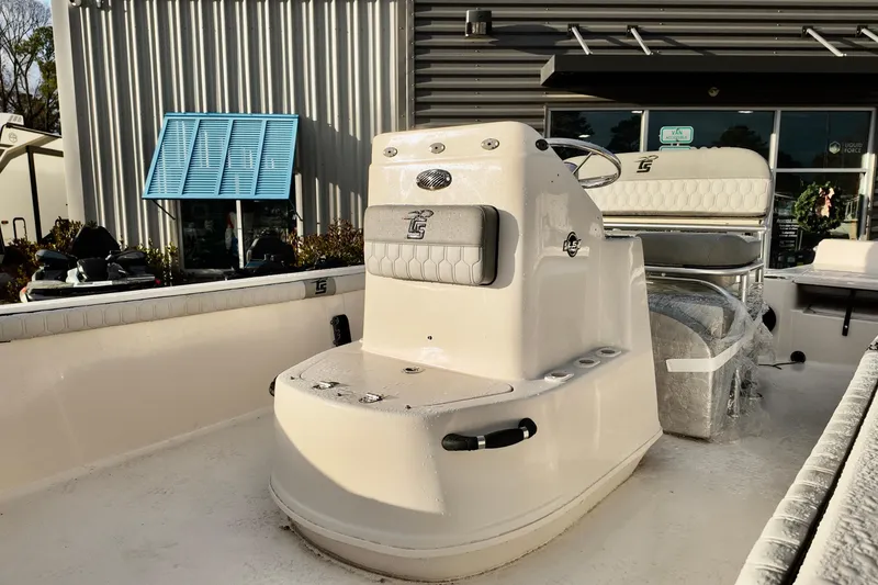 Slide: The Image of 2026 Carolina Skiff 21 LS boat interior with console and seating. - 3