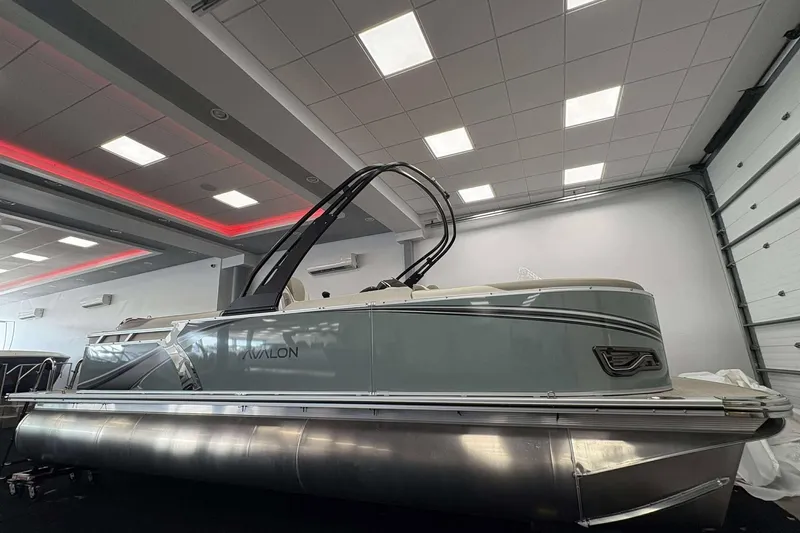 The Image of 2026 Avalon 2385 LSZ pontoon boat displayed indoors with modern design. - 1
