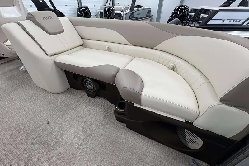 Slide: The Image of Luxurious seating in 2026 Avalon 2385 LSZ boat, featuring beige and brown upholstery. - 11