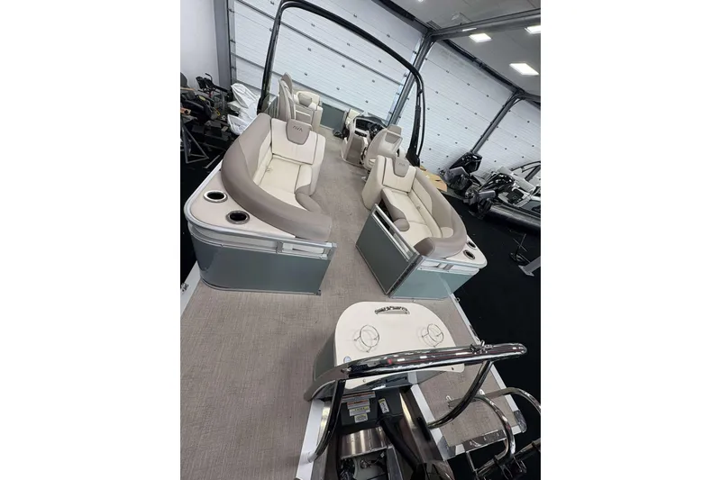 Slide: The Image of 2026 Avalon 2385 LSZ pontoon boat interior with plush seating and modern design. - 21