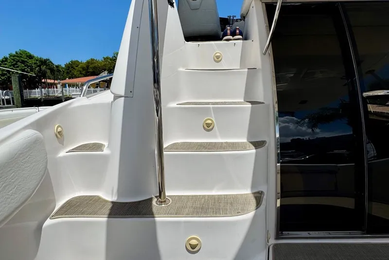 Slide: The Image of Staircase on a 2009 Regal 4080 yacht, leading to upper deck. - 12