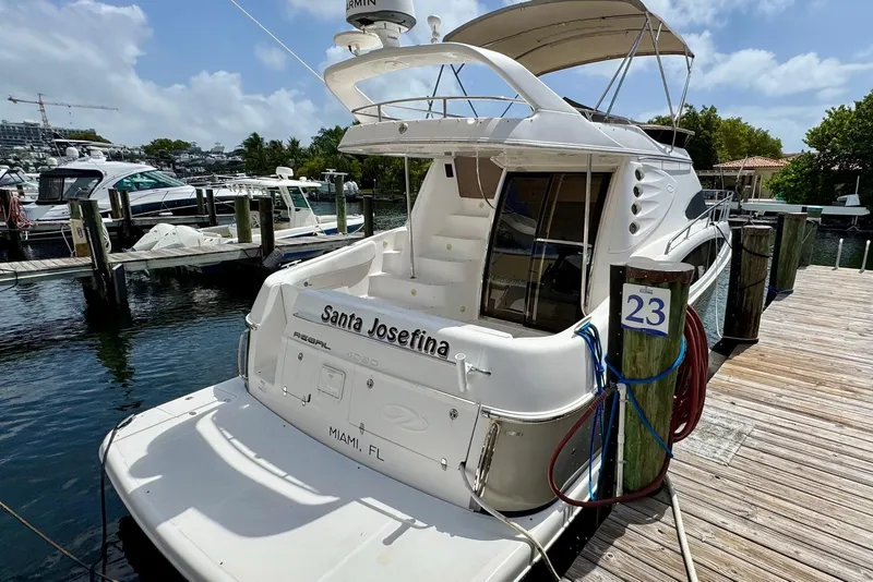 Slide: The Image of Luxury Regal 4080 yacht docked at marina, Miami, FL, 2009 model. - 2