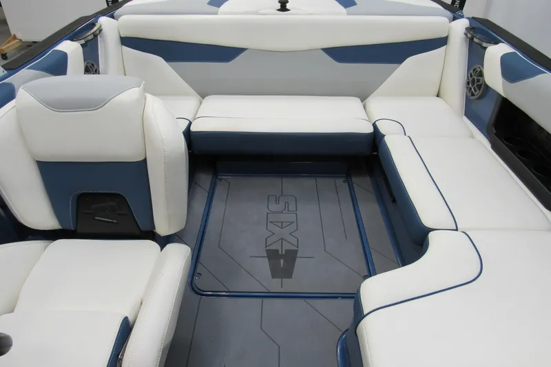 Slide: The Image of 2021 Axis A20 boat interior with white and blue seating arrangement. - 11