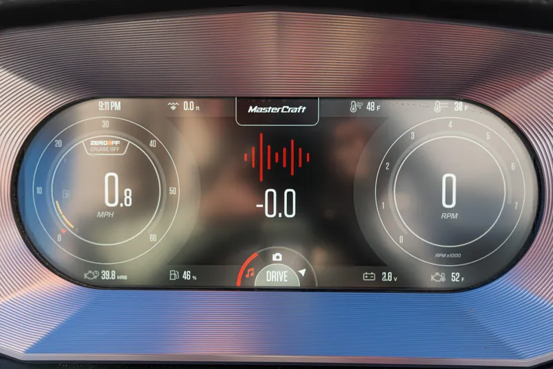 Slide: The Image of Digital dashboard of 2022 MasterCraft X24 boat displaying speed, RPM, and temperature. - 20