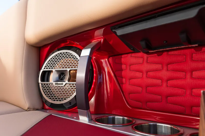 Slide: The Image of 2022 MasterCraft X24 interior with Klipsch speaker and red upholstery detail. - 28