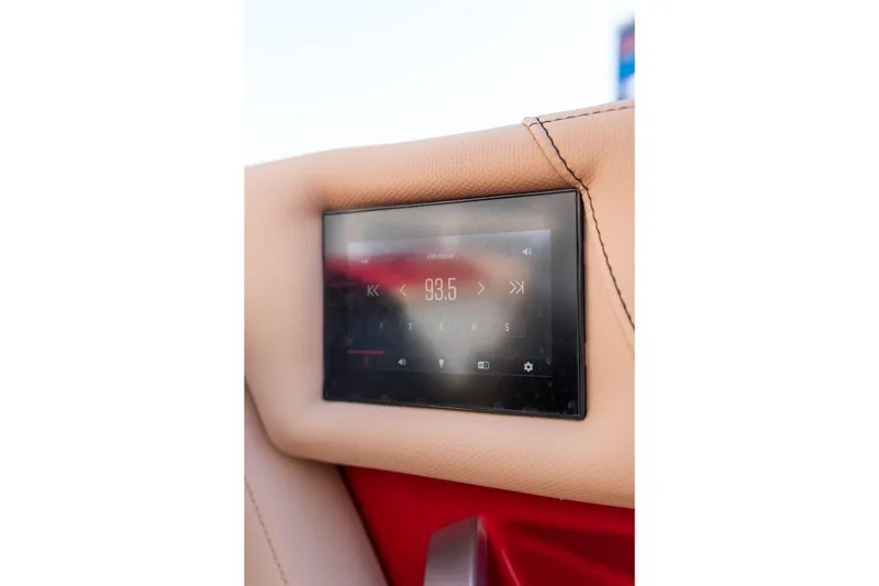 Slide: The Image of 2022 MasterCraft X24 touchscreen display on beige interior panel. - 39