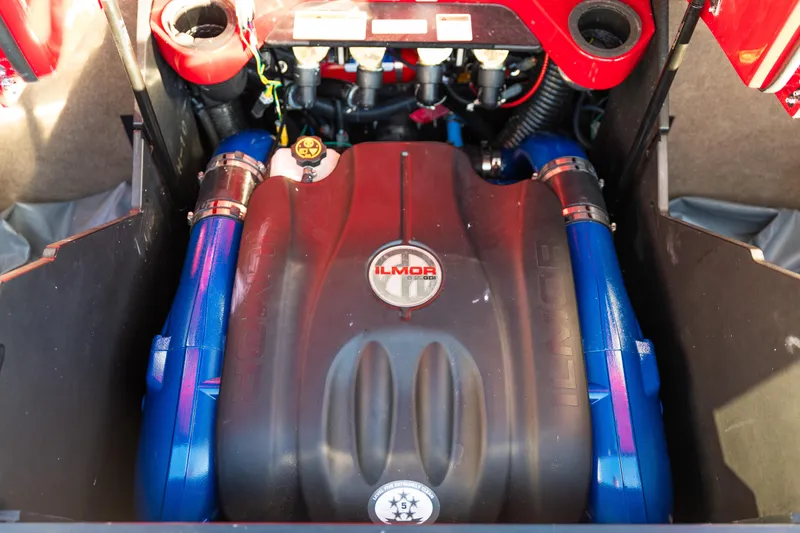 Slide: The Image of 2022 MasterCraft X24 engine compartment featuring Ilmor engine components. - 42