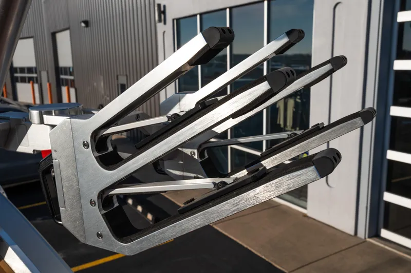 Slide: The Image of 2022 MasterCraft X24 boat rack with sleek metal design. - 44