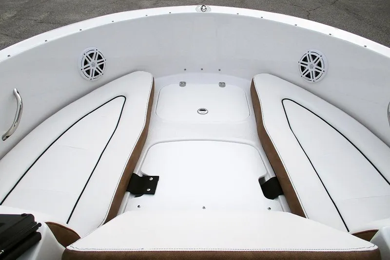 Slide: The Image of 2026 Stingray 172 DC boat interior with white cushioned seating and speakers. - 12